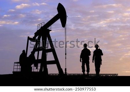 Workers produce oil.