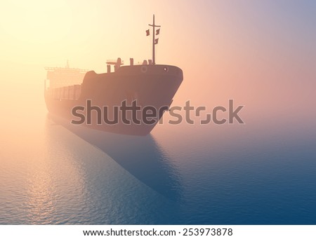 Cargo tanker at dawn in the mist.