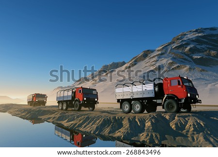 Group of trucks on the road in the mountains.