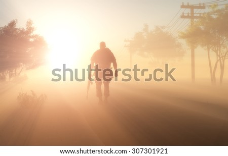 Silhouette of a soldier in the fog.