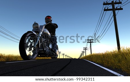 Biker on the road against the sky