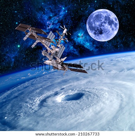 Earth satellite space station spaceship sky stars. Elements of this image furnished by NASA.