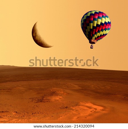 Hot air balloon fantasy desert moon. Elements of this image furnished by NASA.