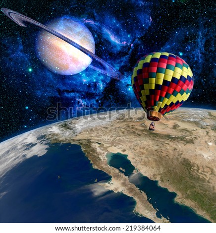 Earth planet Saturn surreal hot air balloon fantasy. Elements of this image furnished by NASA.