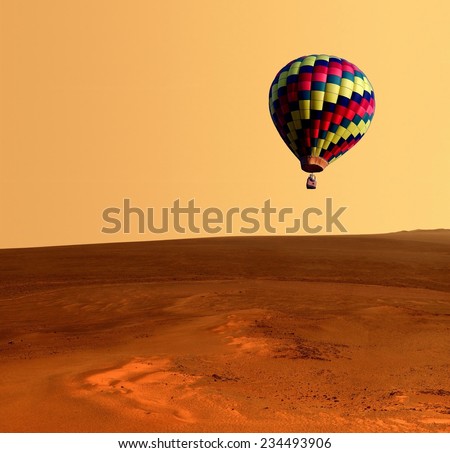 Hot air balloon fantasy desert landscape adventure. Elements of this image furnished by NASA.