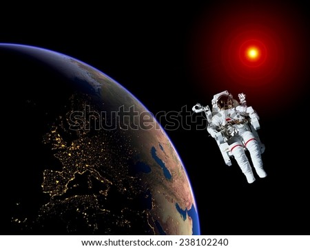 Astronaut spaceman Earth space sun. Elements of this image furnished by NASA.