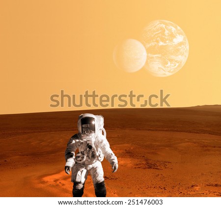 One astronaut spaceman planet Mars surface colony . Elements of this image furnished by NASA.