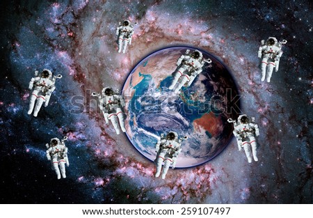 Astronauts spaceman suit planet galaxy people space stars. Elements of this image furnished by NASA.