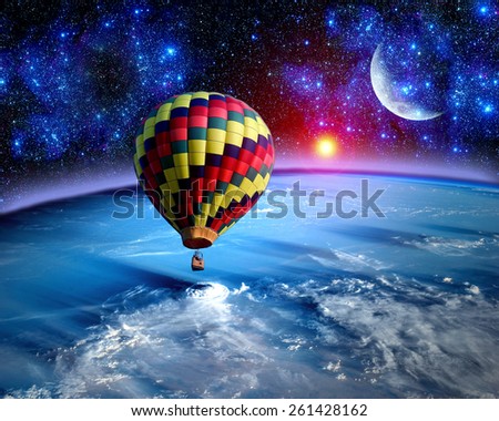 Hot air balloon fairy tale landscape fantasy moon earth. Elements of this image furnished by NASA.