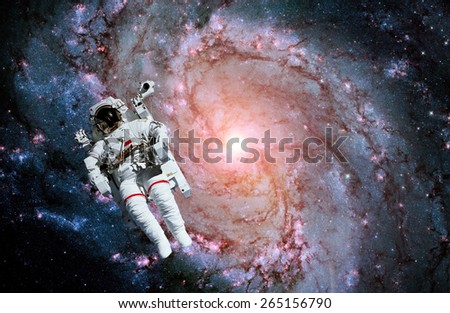 Astronaut spaceman space galaxy spiral milky way stars. Elements of this image furnished by NASA.