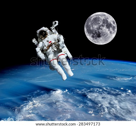 Astronaut spaceman suit earth outer space universe moon. Elements of this image furnished by NASA.