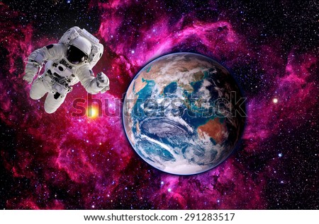 Astronaut spaceman Earth globe world planet outer space. Elements of this image furnished by NASA.