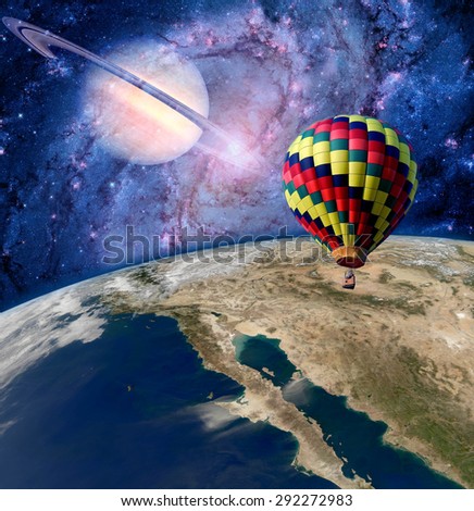 Hot air balloon fairy tale landscape fantasy saturn earth. Elements of this image furnished by NASA.