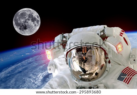 Astronaut spaceman isolated helmet space selfie earth moon. Elements of this image furnished by NASA.