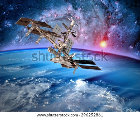 Earth satellite space station spaceship orbit sci fi landscape. Elements of this image furnished by NASA.