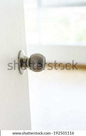 Close up, White Half-open door into room