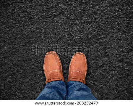top view,Foot stand on black sand stone ,Leave space for your content
