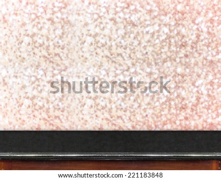 Black marble Table with bokeh pink sparkling background,Empty room for display your product