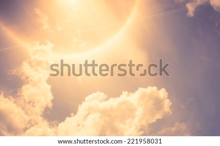 Vintage filter : Sun Halo with cloud and blue sky