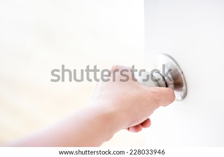 Hand opening door knob-white door