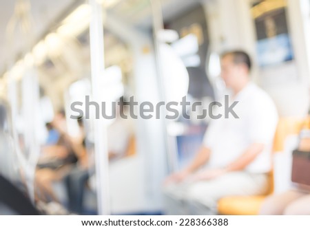 Blurred background : People at electric sky train