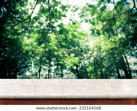 Empty white marble Table top at blurred group of trees ,Template mock up for display of your product,Business presentation