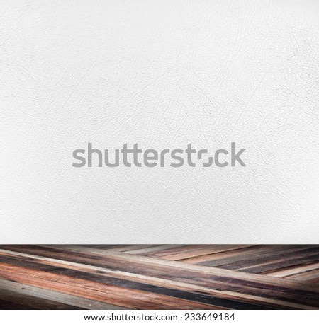 Empty room with white leather wall and diagonal wooden floor,Template mock up for display of your product,business presentation