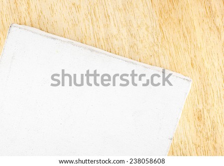 Top view of Blank old dirty canvas on wood table, template mock up for adding your text