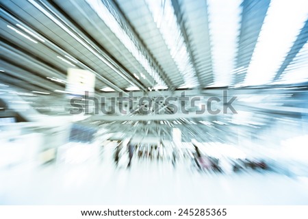 Blurred motion background : Traveler at airport terminal Check-in departure blur background with bokeh light