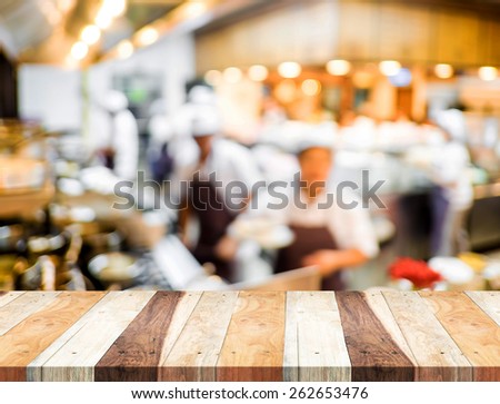 Empty wood table and blurred restaurant light background. product display template.Business presentation.