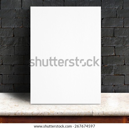 Black White paper poster lean at black brick wall and marble table,Template mock up for adding your text.