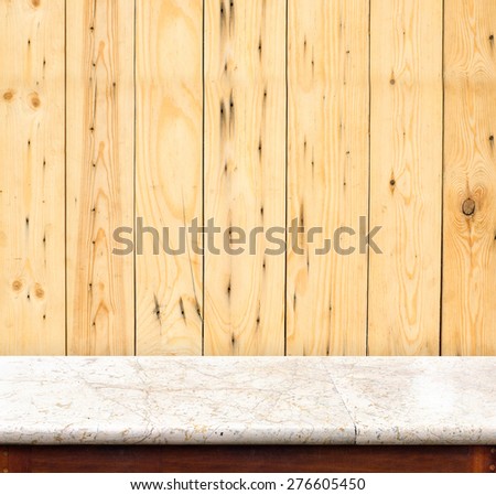 Empty marble table and light wood plank wall in background,product display business template