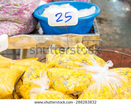 Flower market in Thailand, group of marigold bag sale at market