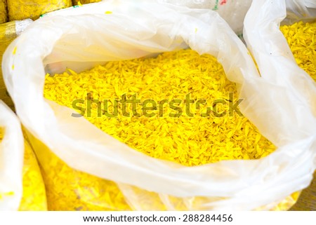 Flower market in Thailand,petal marigold in plastic bag at market