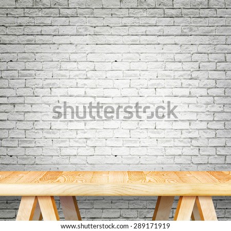 Blank modern wooden table with leg at white brick wall ,Template mock up for display of product
