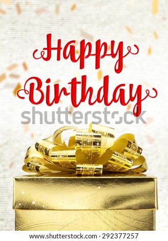 Close up Golden present box with Happy Birthday word and confetti blur background