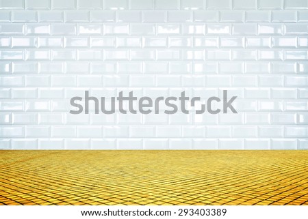 Empty room with white ceramic tile wall and golden mosaic floor, Background for display of product