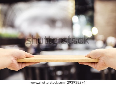 Two hand holding food plate made from wood isolated on white background, Template mock up for adding your product and leave space for adding content ,