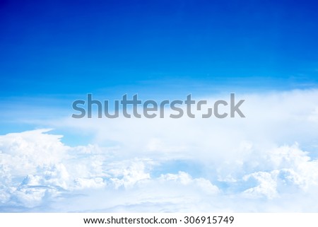 Aerial view of Blue sky and Cloud Top view from airplane window,Nature background.