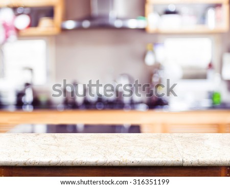 Empty marble table top and blurred kitchen bokeh light in background, Mock up for display of product