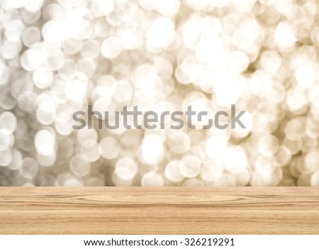 Empty perspective room with sparkling bokeh wall and wooden floor,Template mock up for display of your product.