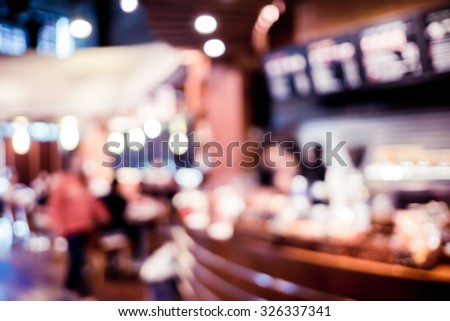 Blurred background : black and white filter ,Customer in Coffee shop blur background with bokeh.
