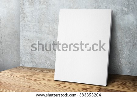 Blank white canvas frame leaning at concrete wall and wood floor, Mock up template for adding your design.
