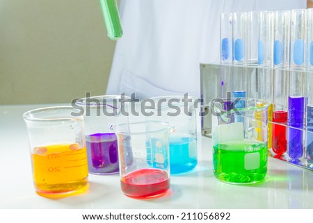 Lab equipment, glassware kit filled with various colored liquids