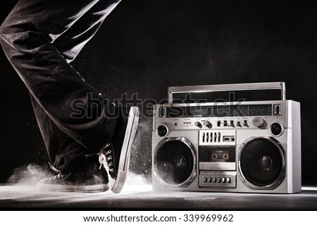 Retro ghetto blaster, dust and dancer isolated on black background with clipping path