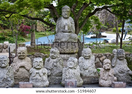 Row of Buddhist statues in a Japanese temple