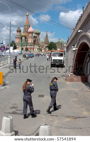 MOSCOW - MAY 29: Female police officers follow the order on the march against breast cancer on MAY 29, 2010 in Moscow, Russia