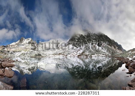 Crystal Lake in the rocky mountains. Mountain lake in National Park High Tatras