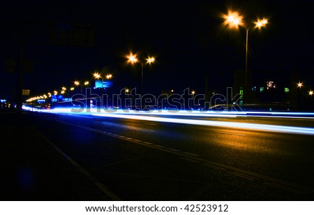 stock photo Night highway with car traffic and blurry lights long 
