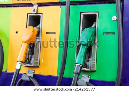 fuel nozzle, gas pump, in service station